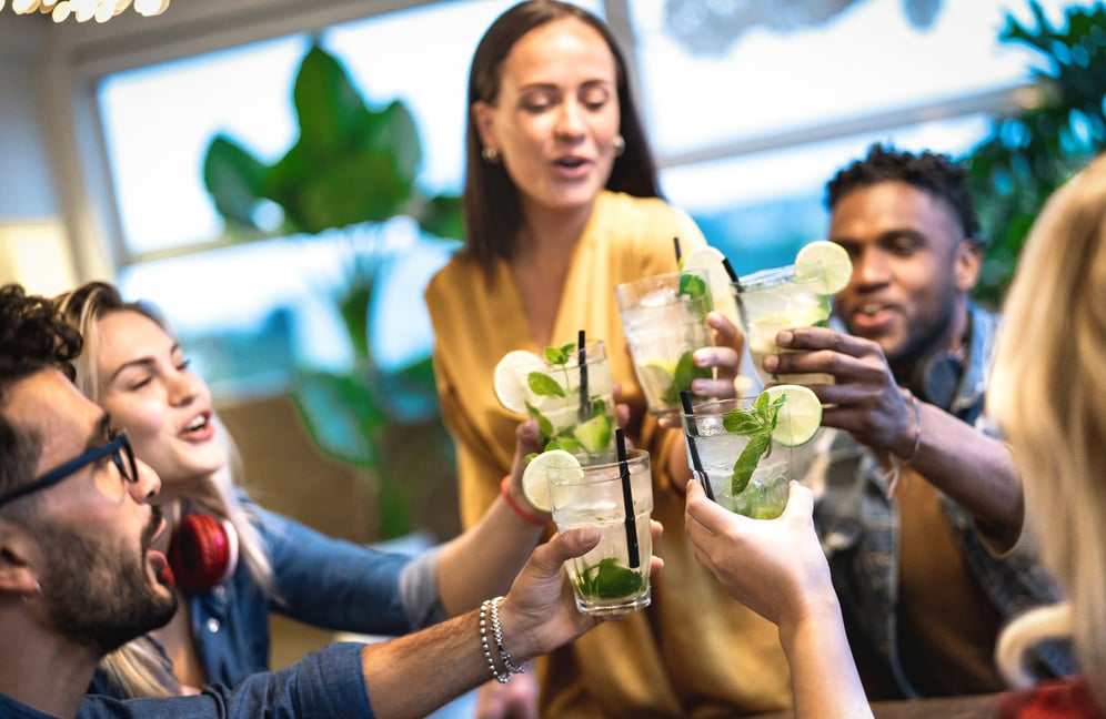 Best Friends Drinking Mojito at a Bar